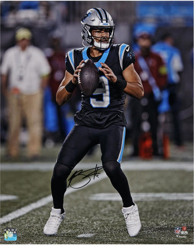 Bryce Young Carolina Panthers Signed 16x20 Vertical Passing Black Jersey Photo