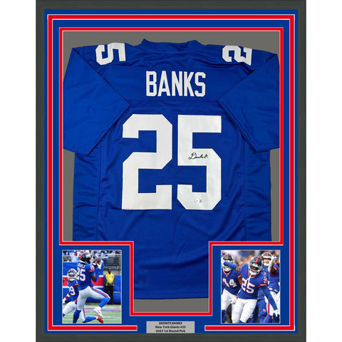 Framed Autographed/Signed Deonte Banks 33x42 New York Blue Jersey BAS COA