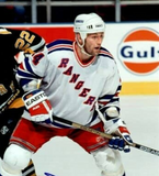 Jay Wells Signed New York Rangers Logo Puck Inscribed "1994 SC Champs" (JSA COA)