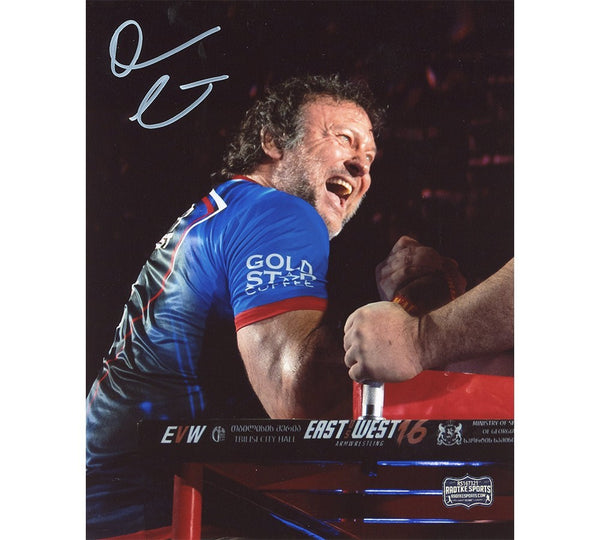 Devon Larratt Signed Unframed 8x10 Arm Wrestling Photo - Blue Shirt