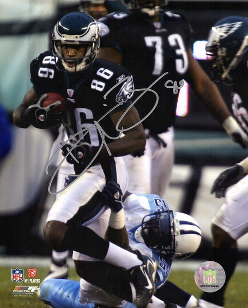Reggie Brown Signed Eagles Action vs Titans 8x10 Photo - (SCHWARTZ COA)