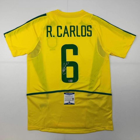 Autographed/Signed Roberto Carlos Brazil Yellow Soccer Jersey Beckett BAS COA