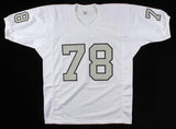 Art Shell Signed Raiders Jersey Inscribed "HOF 89" (JSA COA) 8xPro Bowl Tackle