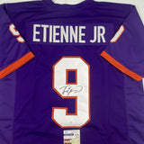 Autographed/Signed TRAVIS ETIENNE Clemson Purple College Jersey JSA COA