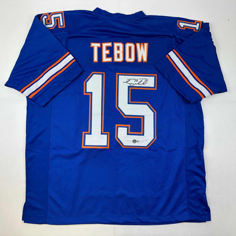 Autographed/Signed Tim Tebow Florida Blue College Jersey Beckett BAS COA
