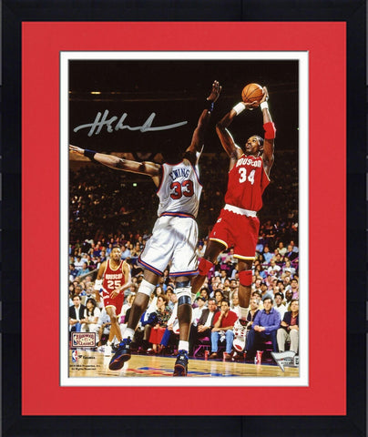 Framed Hakeem Olajuwon Houston Rockets Autographed 8" x 10" Jumping Photograph