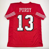 Autographed/Signed Brock Purdy San Francisco Red Football Jersey Beckett BAS COA