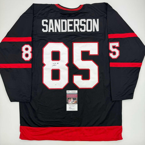 Autographed/Signed Jake Sanderson Ottawa Black Hockey Jersey JSA COA