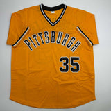 Autographed/Signed Manny Sanguillen Pittsburgh Yellow Jersey JSA COA