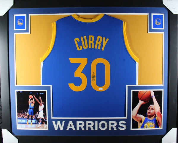 STEPH CURRY (Warriors blue SKYLINE) Signed Autographed Framed Jersey JSA