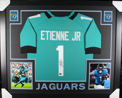 TRAVIS ETIENNE (Jaguars teal SKYLINE) Signed Autographed Framed Jersey Beckett