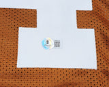 TEXAS RICKY WILLIAMS AUTOGRAPHED ORANGE JERSEY "98 HEISMAN" BECKETT QR 237064