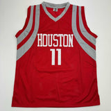 Autographed/Signed Yao Ming Houston Red Basketball Jersey Beckett BAS COA