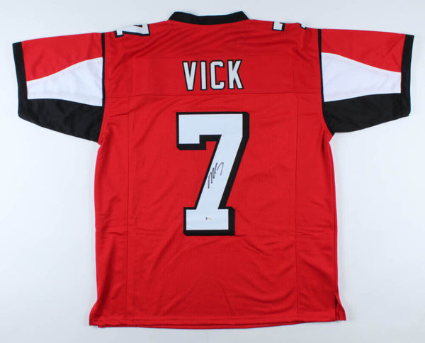 Michael Vick Signed Atlanta Falcons Red Jersey (Beckett COA) 4xPro Bowl QB