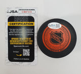 Stan Mikita Signed Chicago Blackhawks Logo Puck (JSA) 9xAll Star / HOF Center