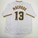 Autographed/Signed MANNY MACHADO San Diego Pinstripe Jersey Beckett COA