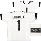 JAGUARS TRAVIS ETIENNE AUTOGRAPHED SIGNED WHITE JERSEY BECKETT WITNESS 220897