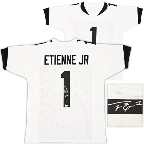 JAGUARS TRAVIS ETIENNE AUTOGRAPHED SIGNED WHITE JERSEY BECKETT WITNESS 220897
