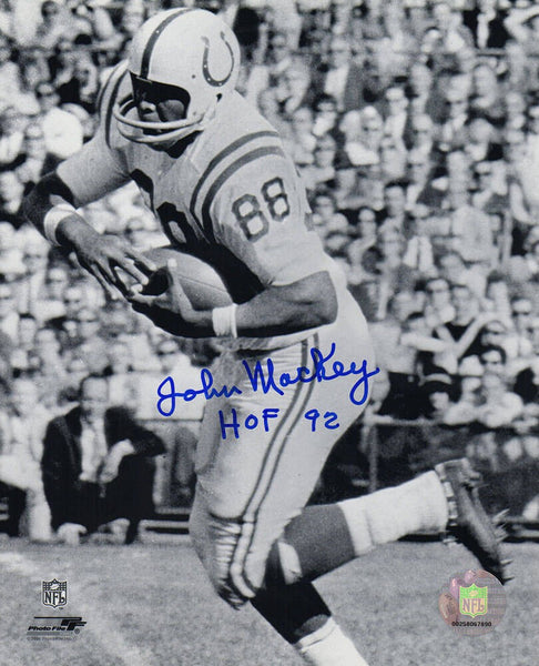 John Mackey Signed Colts B&W With Football 8x10 Photo w/HOF'92 - (SCHWARTZ COA)