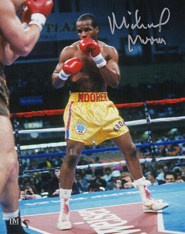 Michael Moorer Signed Boxing Gold Trunks Action 8x10 Photo - (SCHWARTZ COA)