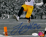LeVeon Bell Autographed Steelers 8x10 B&W With Color PF. Jumping- JSA W Auth