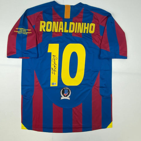 Autographed/Signed Ronaldinho Barcelona Blue/Red Soccer Jersey Beckett BAS COA
