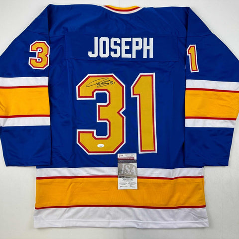 Autographed/Signed Curtis Joseph St. Louis Blue Hockey Jersey JSA COA