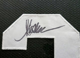 RAIDERS MARCUS ALLEN AUTOGRAPHED FRAMED BLACK JERSEY BECKETT WITNESS 210139