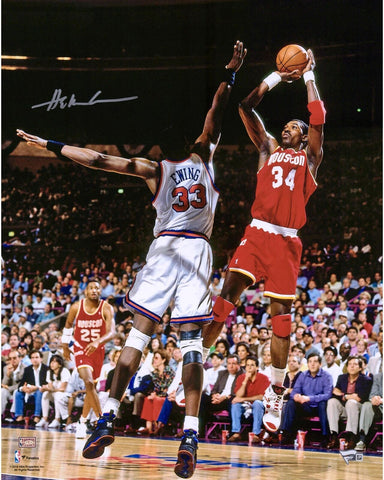 Hakeem Olajuwon Houston Rockets Autographed 16" x 20" Jumping Photograph