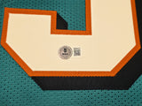 MIAMI DOLPHINS JASON TAYLOR AUTOGRAPHED TEAL JERSEY BECKETT BAS WITNESS 239803
