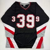 Autographed/Signed Dominik Hasek Buffalo Black Hockey Jersey Beckett BAS COA