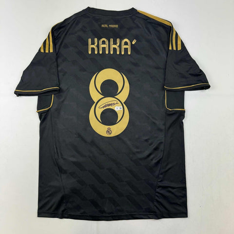 Autographed/Signed Ricardo Kaka Real Madrid Black Soccer Futbol Jersey BAS COA