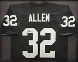 RAIDERS MARCUS ALLEN AUTOGRAPHED FRAMED BLACK JERSEY BECKETT WITNESS 210139