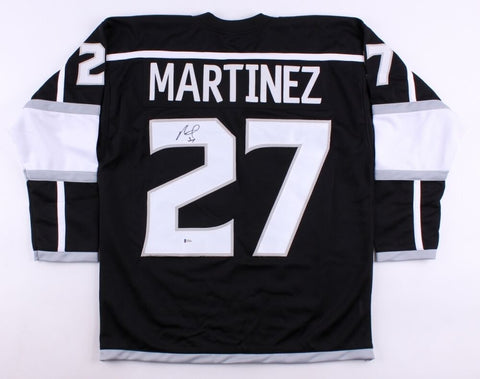 Alec Martinez Signed L.A.Kings Jersey (Beckett COA) Playing career 2008-present