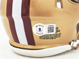 BRYANT YOUNG AUTOGRAPHED 49ERS GOLD MINI HELMET HOF 22 BECKETT WITNESS 215663