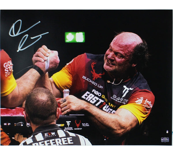 Devon Larratt Signed Unframed 16x20 Arm Wrestling Photo - Black, Red & Yellow