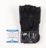 Randy Couture Signed UFC Glove (Beckett) MMA Record 19-11 / 3xHeavy Weight Champ