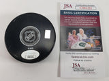 Connor McMichael Signed Washington Capitals Logo Puck (JSA COA) 2023 Calder Cup