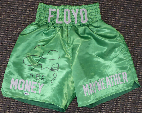 FLOYD MAYWEATHER JR. AUTOGRAPHED GREEN BOXING TRUNKS "TBE" BECKETT BAS 159664