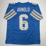 Autographed/Signed Terrion Arnold Detroit Blue Football Jersey Beckett BAS COA
