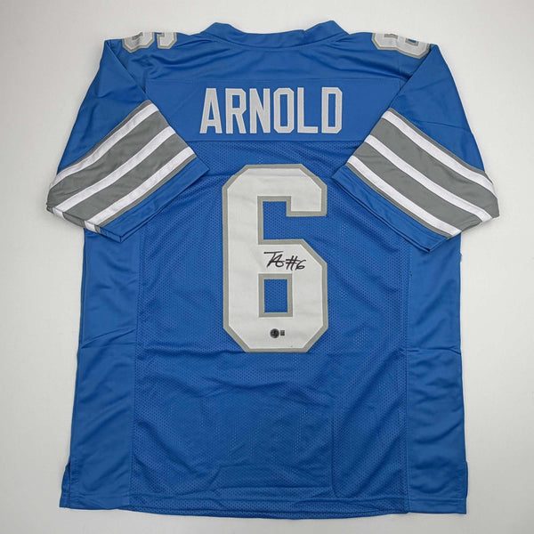 Autographed/Signed Terrion Arnold Detroit Blue Football Jersey Beckett BAS COA