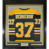 Framed Signed Patrice Bergeron 35x39 Boston Black Jersey PSA COA
