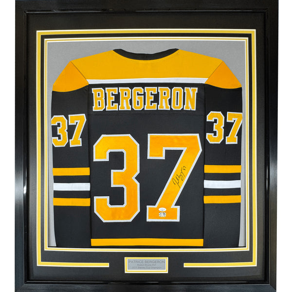 Framed Signed Patrice Bergeron 35x39 Boston Black Jersey PSA COA