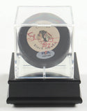 Stan Mikita Signed Chicago Blackhawks Logo Puck w/Display Case (PSA) HOF Center