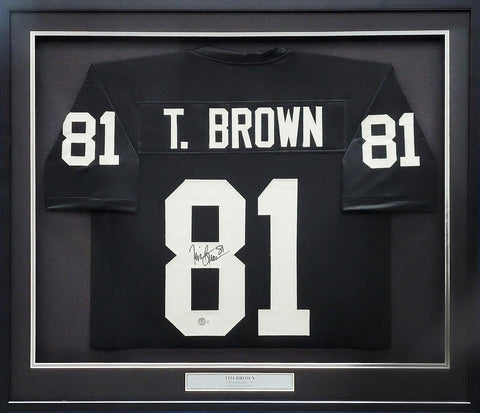 OAKLAND RAIDERS TIM BROWN AUTOGRAPHED FRAMED BLACK JERSEY BECKETT WITNESS 210138