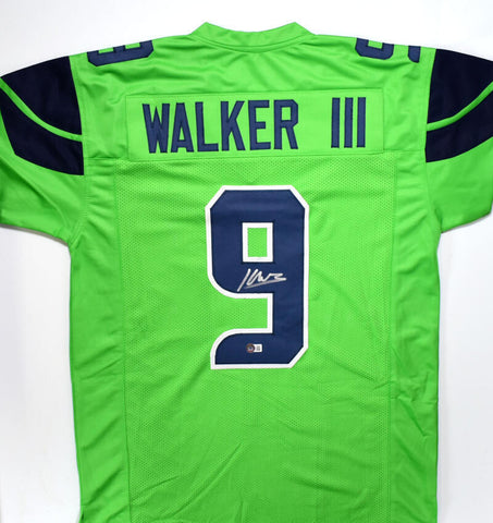 Kenneth Walker III Autographed Green Pro Style Jersey-Beckett W Hologram *Silver
