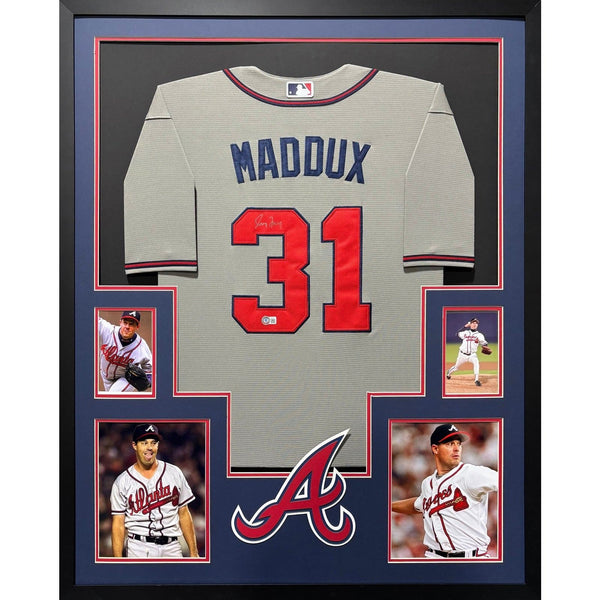Greg Maddux Autographed Signed Framed Grey Atlanta Braves Jersey BECKETT