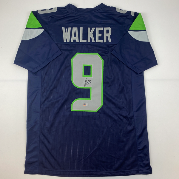 Autographed/Signed Kenneth Walker Seattle Blue Football Jersey Beckett BAS COA