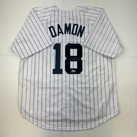 Autographed/Signed Johnny Damon New York Pinstripe Baseball Jersey Beckett COA
