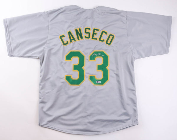 Jose Canseco Signed Athletics Jersey (Beckett) 2xWorld Series Champ/ Oakland A's